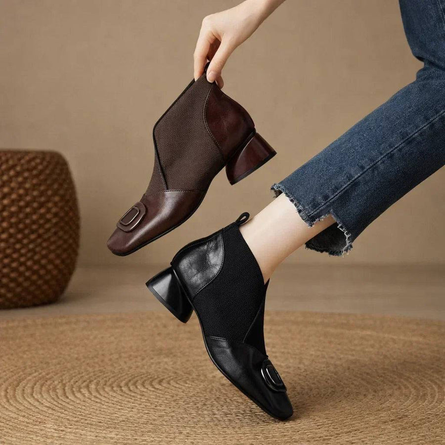 Opium leather boots by THE WHITMORE FAMILY featuring a stylish ankle-high design and detailed stitching, perfect for casual wear.