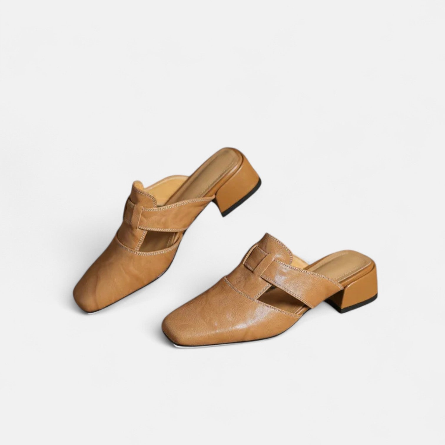 Apricot leather sandals from THE WHITMORE FAMILY's Andie™ collection, featuring elegant design and comfortable straps.