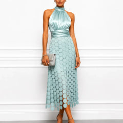 IRÈNE midi dress by THE WHITMORE FAMILY, featuring a flowy fabric, fitted waist, and elegant design perfect for stylish occasions.