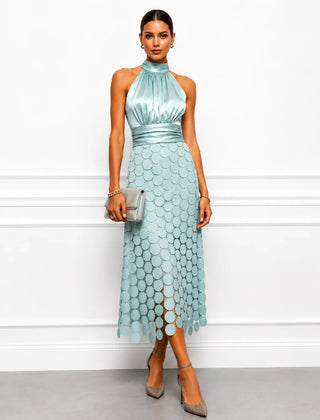 IRÈNE midi dress by THE WHITMORE FAMILY, featuring a flowy fabric, fitted waist, and elegant design perfect for stylish occasions.