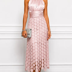 IRÈNE midi dress by THE WHITMORE FAMILY, showcasing a stylish, elegant dress with a fitted waist and flowing skirt.
