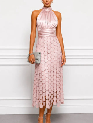 IRÈNE midi dress by THE WHITMORE FAMILY, showcasing a stylish, elegant dress with a fitted waist and flowing skirt.
