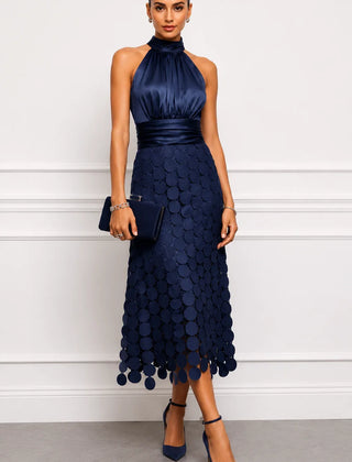 IRÈNE midi dress by THE WHITMORE FAMILY featuring a flowy fabric and stylish design, shown on a model.