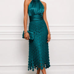 IRÈNE midi dress by THE WHITMORE FAMILY, featuring a flowing silhouette and elegant design, displayed on a model.