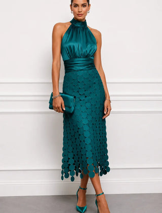 IRÈNE midi dress by THE WHITMORE FAMILY, featuring a flowing silhouette and elegant design, displayed on a model.
