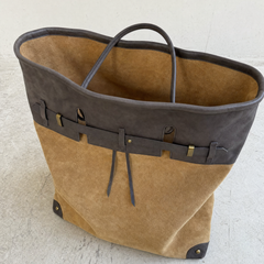 Interior view of THE WHITMORE FAMILY Juliette Suede Tote bag showing spacious interior and suede lining.