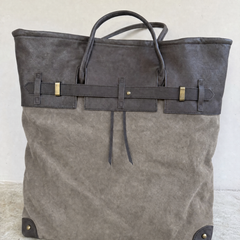 THE WHITMORE FAMILY Juliette Suede Tote bag featuring a sleek front view, soft suede material, and spacious interior.