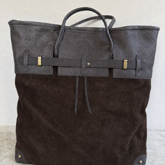 Front view of THE WHITMORE FAMILY Juliette Suede Tote bag with sleek design and spacious interior.