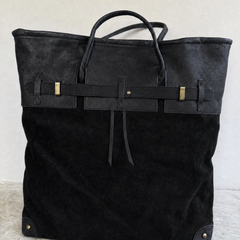 The Juliette Suede Tote bag by THE WHITMORE FAMILY, featuring a front view with soft suede texture and stylish design.