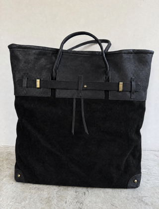The Juliette Suede Tote bag by THE WHITMORE FAMILY, featuring a front view with soft suede texture and stylish design.