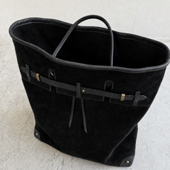 Interior view of THE WHITMORE FAMILY Juliette Suede Tote bag showing spacious compartment and soft suede lining.
