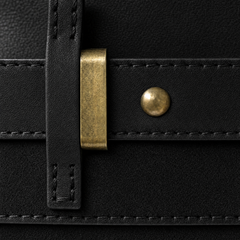 Close-up of The Juliette Suede Tote bag by THE WHITMORE FAMILY showing soft suede texture and stylish design details.