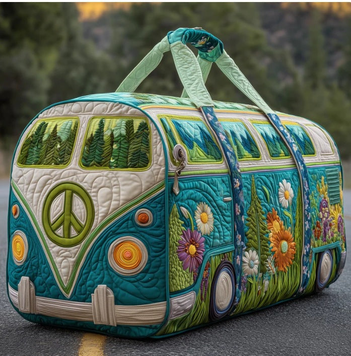 A quilted AQUAVANA travel duffle bag by THE WHITMORE FAMILY with sturdy handles and spacious main compartment.
