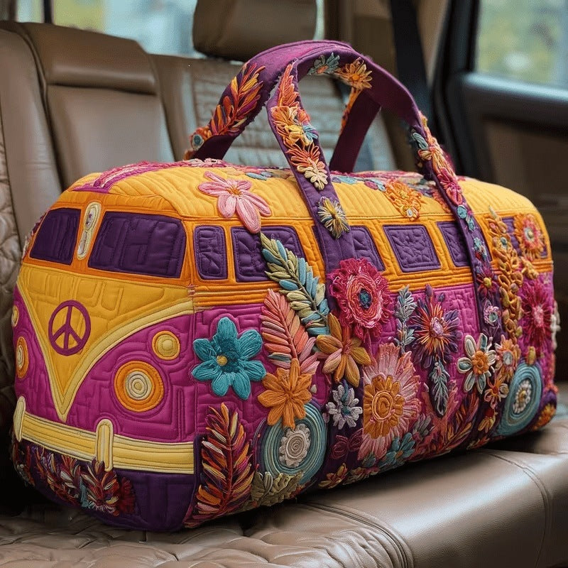 The Whitmore Family FLORAVANA quilted travel duffle bag with top handles and zipper closure, shown in a stylish quilted design.