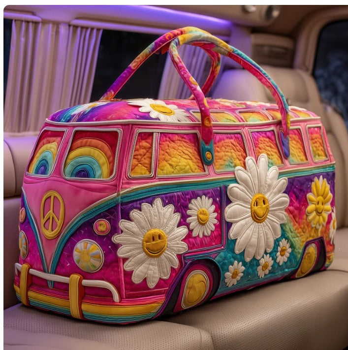 Joyvana quilted travel duffle bag by The Whitmore Family, featuring a spacious design and quilted fabric for versatile travel use.