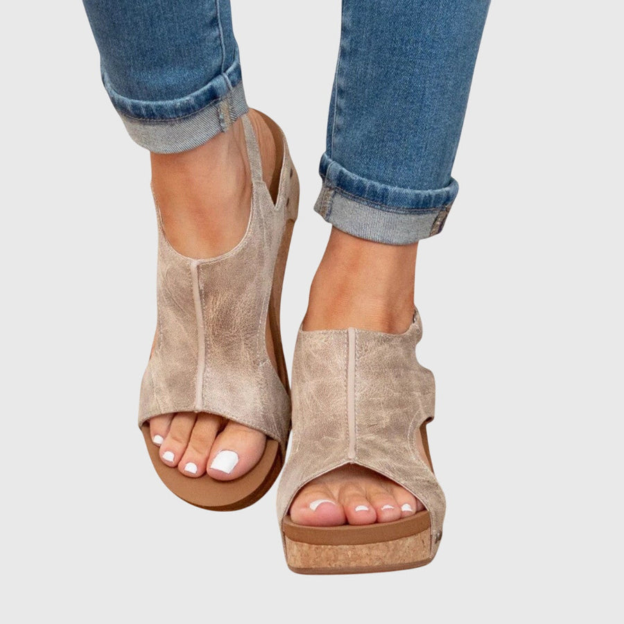 Beige Adela™ orthopedic sandals by THE WHITMORE FAMILY featuring supportive straps and cushioned footbed for comfort.
