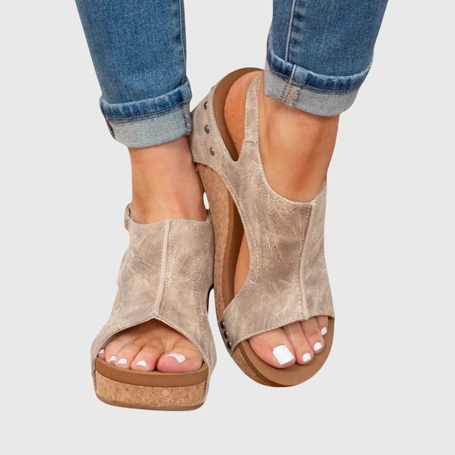 Beige Adela™ orthopedic sandals by THE WHITMORE FAMILY with cushioned straps and supportive soles for comfortable wear.
