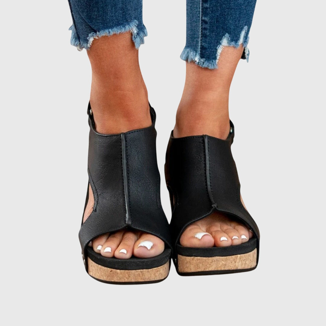 Beige Adela™ orthopedic sandals by THE WHITMORE FAMILY, featuring supportive design and comfortable straps.