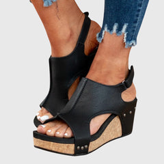 Beige Adela™ orthopedic sandals by THE WHITMORE FAMILY with cushioned soles and supportive straps, designed for comfort.