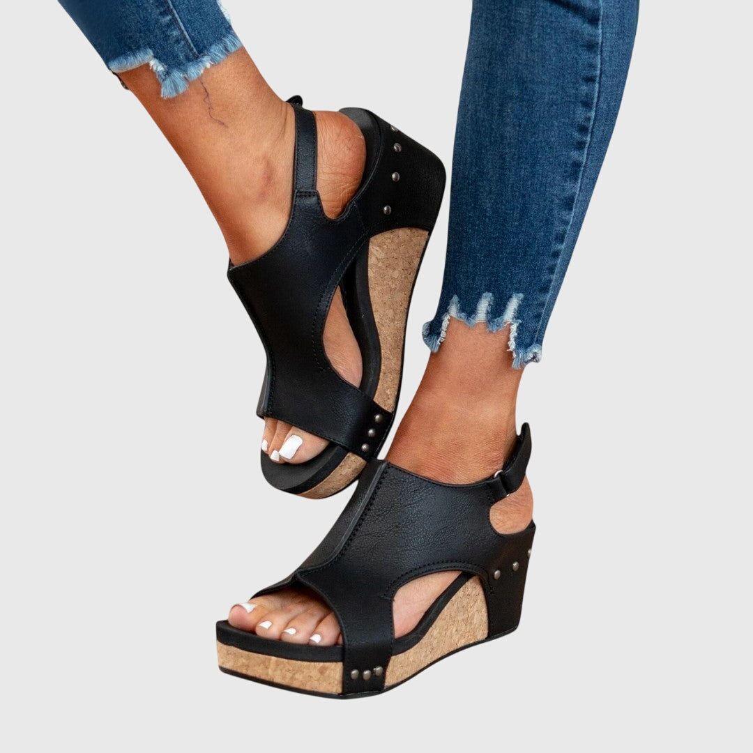Beige Adela™ orthopedic sandals by THE WHITMORE FAMILY featuring supportive straps and cushioned footbed for comfort.