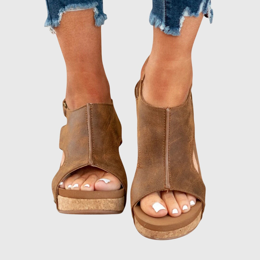 Beige Adela™ orthopedic sandals by THE WHITMORE FAMILY, featuring supportive design and comfortable straps for everyday wear.