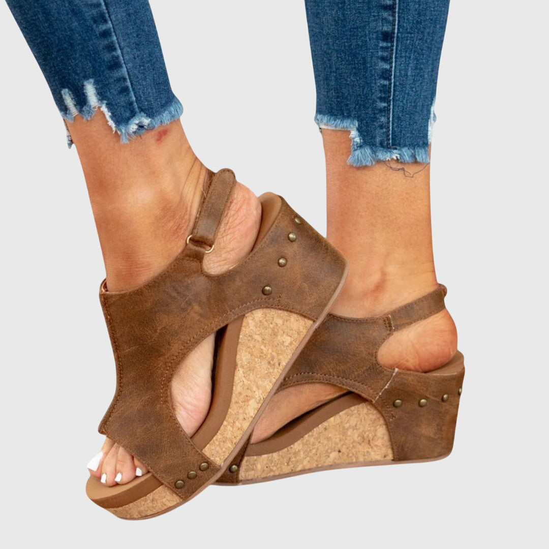Beige Adela™ orthopedic sandals by THE WHITMORE FAMILY with cushioned soles and adjustable straps, designed for comfort and support