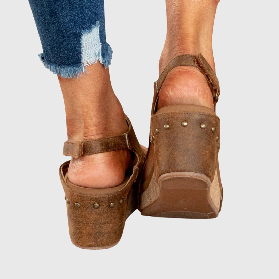 Beige Adela™ orthopedic sandals by THE WHITMORE FAMILY featuring supportive design and comfortable straps.