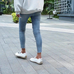 Beige Célya™ ergonomic support sneakers by THE WHITMORE FAMILY with cushioned soles and breathable upper for comfortable walking.