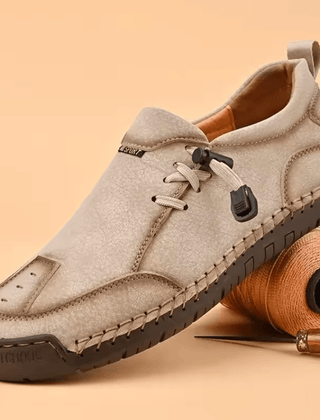 Beige Célya™ ergonomic support sneakers by THE WHITMORE FAMILY featuring cushioned soles and supportive design for comfort.