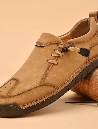 Beige Célya™ ergonomic support sneakers by THE WHITMORE FAMILY, featuring cushioned soles and stylish, comfortable design.