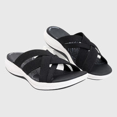 Beige Jade™ orthopedic sandals by THE WHITMORE FAMILY featuring cushioned soles and supportive straps for comfort.