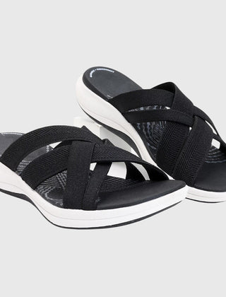 Beige Jade™ orthopedic sandals by THE WHITMORE FAMILY featuring cushioned soles and supportive straps for comfort.