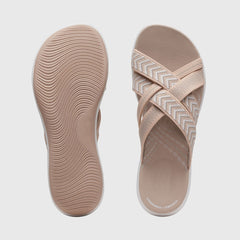 Beige Jade™ orthopedic sandals by THE WHITMORE FAMILY featuring cushioned soles and supportive straps for comfort.