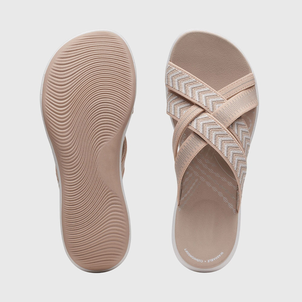 Beige Jade™ orthopedic sandals by THE WHITMORE FAMILY featuring cushioned soles and supportive straps for comfort.