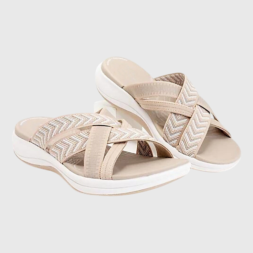 Beige Jade™ orthopedic sandals by THE WHITMORE FAMILY with cushioned soles and adjustable straps, designed for comfort and support.
