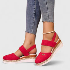 Beige Maylien™ orthopedic sandals by THE WHITMORE FAMILY with cushioned straps and supportive soles for comfortable wear.
