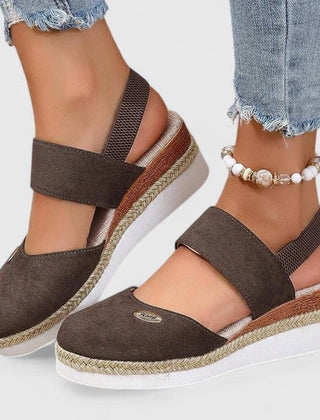 Beige Maylien™ orthopedic sandals by THE WHITMORE FAMILY featuring cushioned soles and adjustable straps.