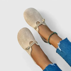 Beige Norah™ orthopedic loafers by THE WHITMORE FAMILY, featuring a classic slip-on design and cushioned comfort.