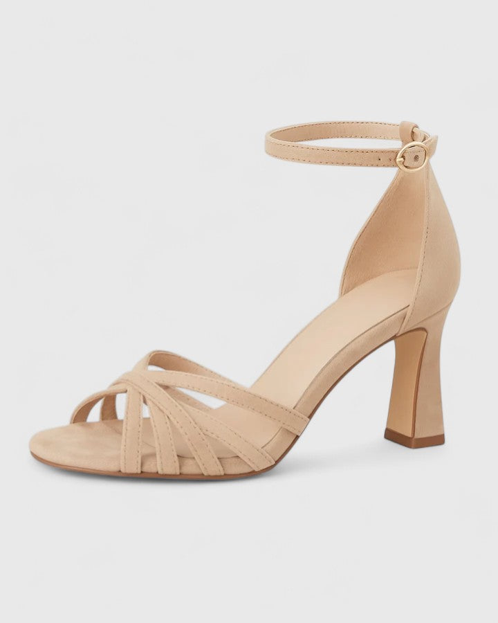 Beige Orlissa comfortable heels by THE WHITMORE FAMILY featuring a sleek design and cushioned sole for all-day wear.