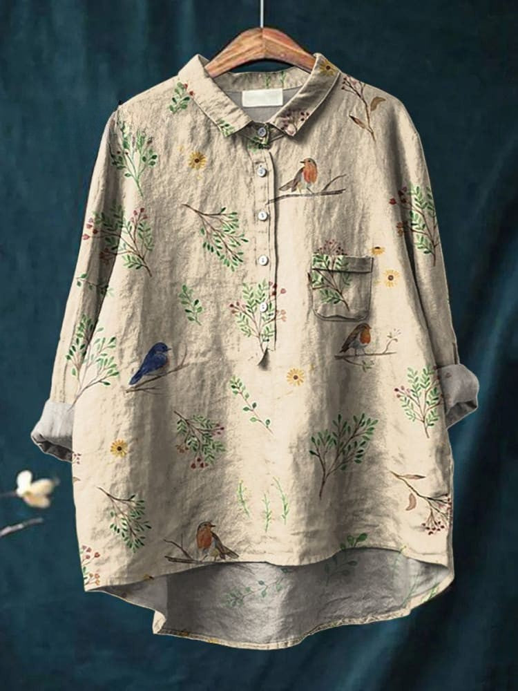 Beige Ella Birdsong Shirt by THE WHITMORE FAMILY featuring a delicate bird pattern on soft fabric.