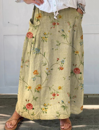 Beige Mella™ retro floral art elastic waistband pocket skirt by THE WHITMORE FAMILY, featuring vintage-inspired design and side pockets.