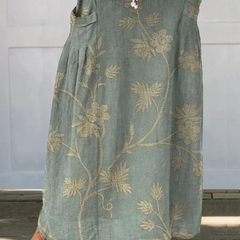 Beige Mella™ floral art elastic waistband pocket skirt by THE WHITMORE FAMILY, featuring a retro elegant design and functional pockets.