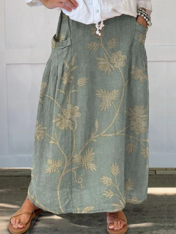 Beige Mella™ floral art elastic waistband pocket skirt by THE WHITMORE FAMILY, featuring a retro elegant design and functional pockets.