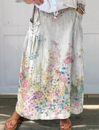 Beige Mella™ retro floral art skirt with elastic waistband and pockets, designed by THE WHITMORE FAMILY.