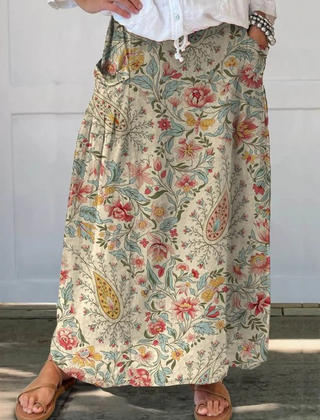 Nilva™ vintage floral art printed pocket skirt by THE WHITMORE FAMILY, beige fabric with floral pattern and functional pockets.