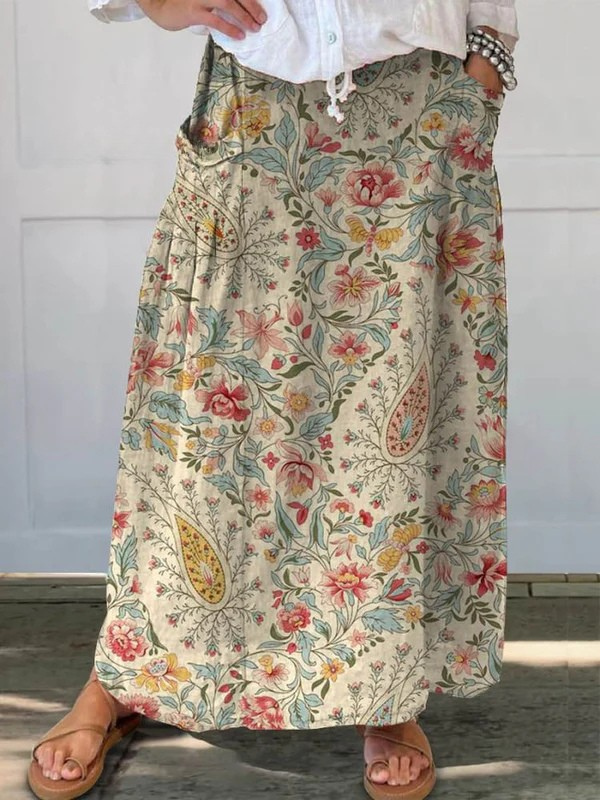 Nilva™ vintage floral art printed pocket skirt by THE WHITMORE FAMILY, beige fabric with floral pattern and functional pockets.