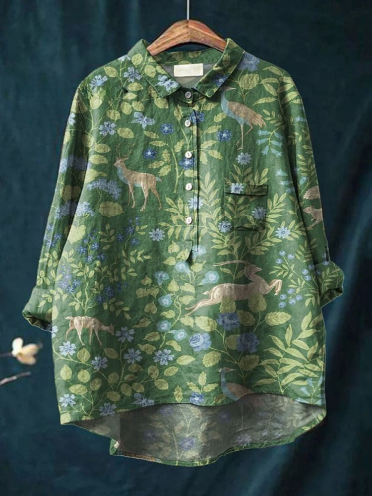 Beige Olivia Floral Forest Shirt by THE WHITMORE FAMILY featuring a botanical print, button front, and casual fit, displayed on mannequin.