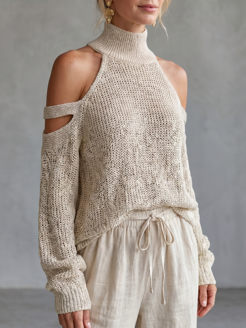 Beige open shoulder knit top and wide-leg pants set by THE WHITMORE FAMILY, displayed on a model.
