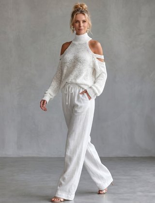 Beige open shoulder knit top and wide leg pants set by THE WHITMORE FAMILY, stylish and comfortable casual wear.