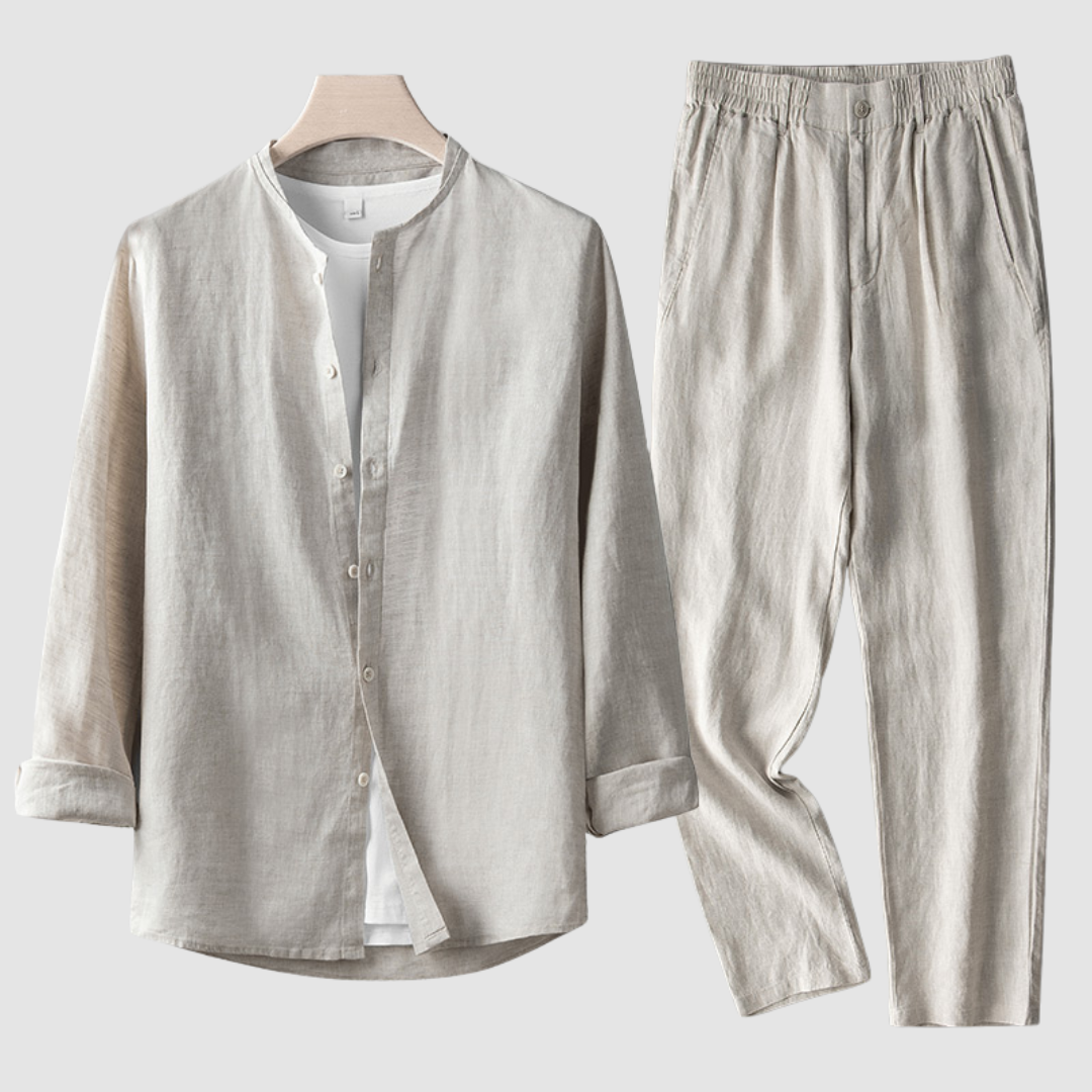Beige Larkin™ Linen Set by THE WHITMORE FAMILY, featuring soft, textured linen fabric with neatly folded sheets and pillowcases.